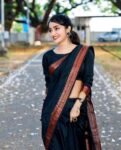 Stunning Black Colour Pure Semi Silk Saree with Heavy Brocade Blouse